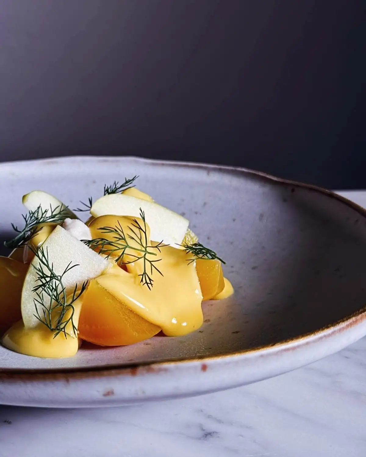 A delightful stop on your food and drink adventure: 
golden turnip, 
velvety hollandaise, 
crisp apple, 
toasted almonds, 
and fragrant herbs

#staycarico #milano #cocktail